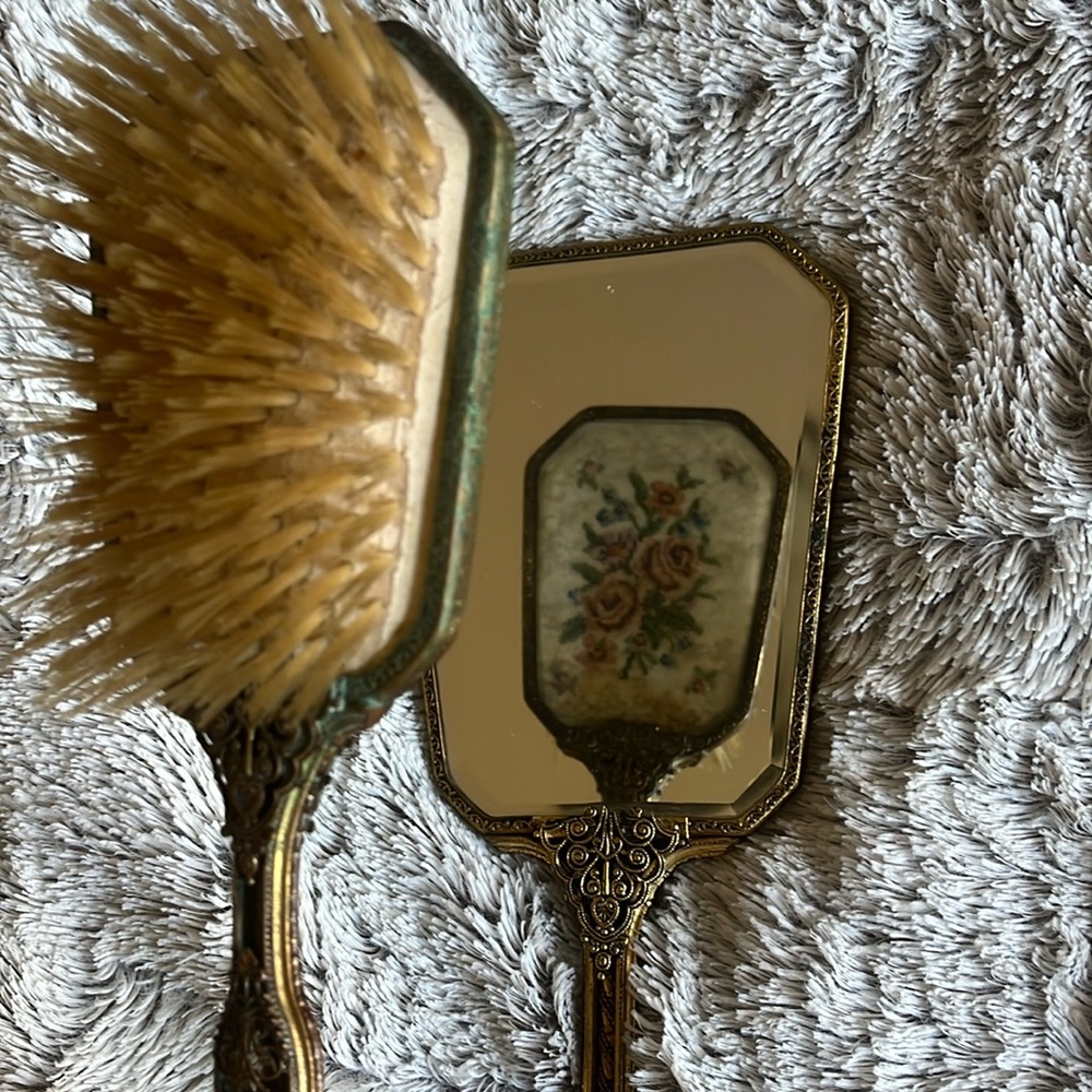Antique mirror and brush set. Velvet with floral embordery design on back.